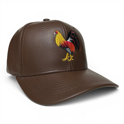 ROABEN brown PU leather snapback cap with rooster design, 6-panel construction, mid-profile crown, and slight curved visor.