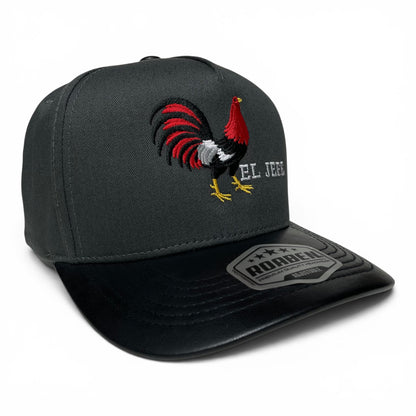 ROABEN gray baseball snapback cap with El Jefe rooster embroidery, PU leather visor, slight curved brim, and adjustable closure.