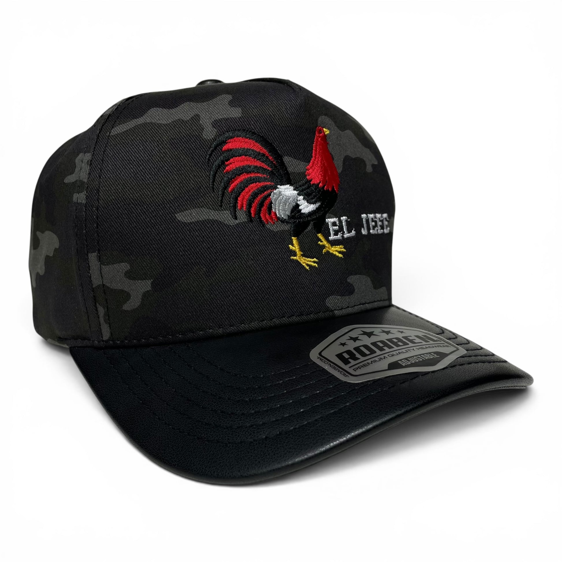 Premium ROABEN camo snapback cap with El Jefe rooster embroidery, structured front panels, and slight curved visor.