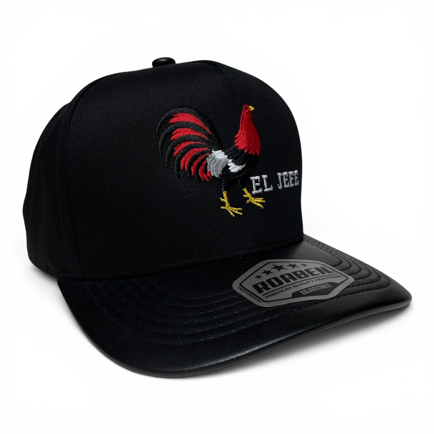 ROABEN black baseball snapback cap featuring the El Jefe rooster design, structured crown, slight curved brim, and adjustable snapback closure.