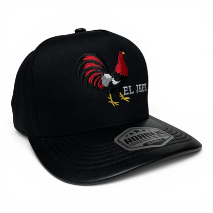 ROABEN black baseball snapback cap featuring the El Jefe rooster design, structured crown, slight curved brim, and adjustable snapback closure.